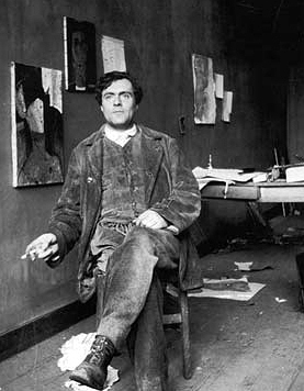 Photograph of Amedeo Modigliani (1884–1920) in his studio rue de la Grande-Chaumière, at Montparnasse.